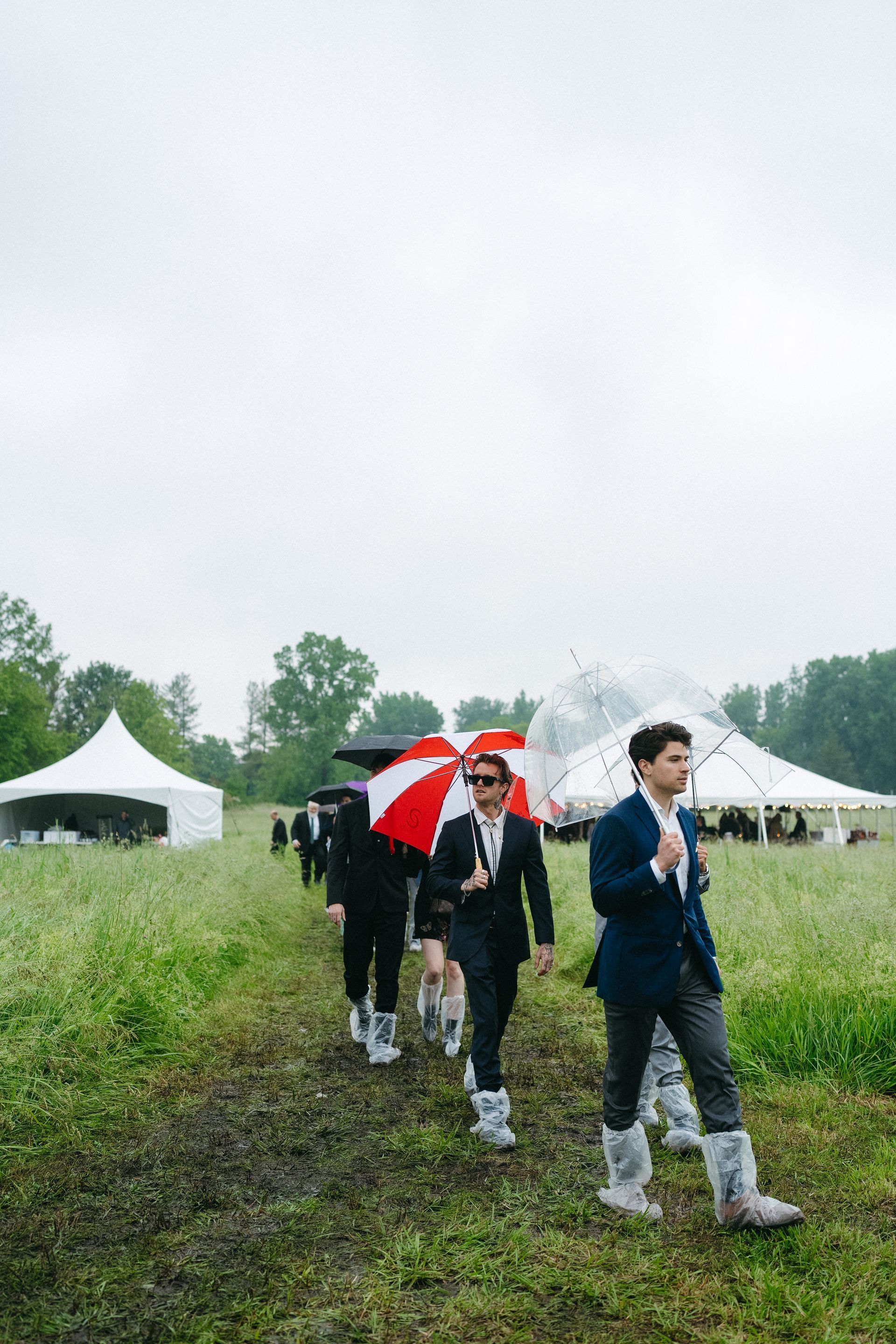 Amanda and Dylan Matthews by Fifi’s Bridal A Rainy Wedding Day 2024