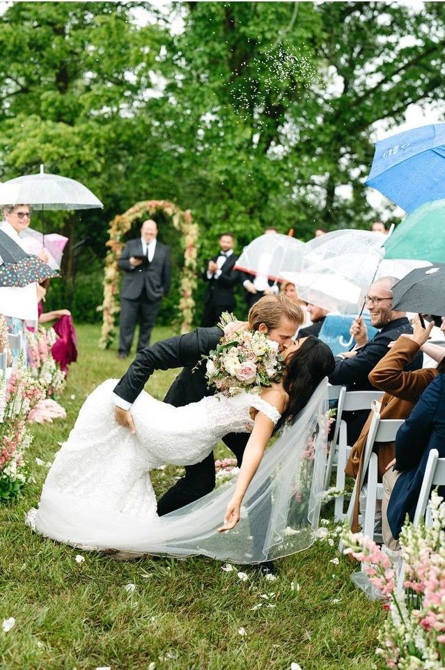Amanda and Dylan Matthews by Fifi’s Bridal A Rainy Wedding Day 2024