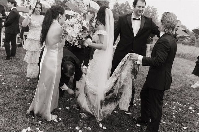 Amanda and Dylan Matthews by Fifi’s Bridal A Rainy Wedding Day 2024