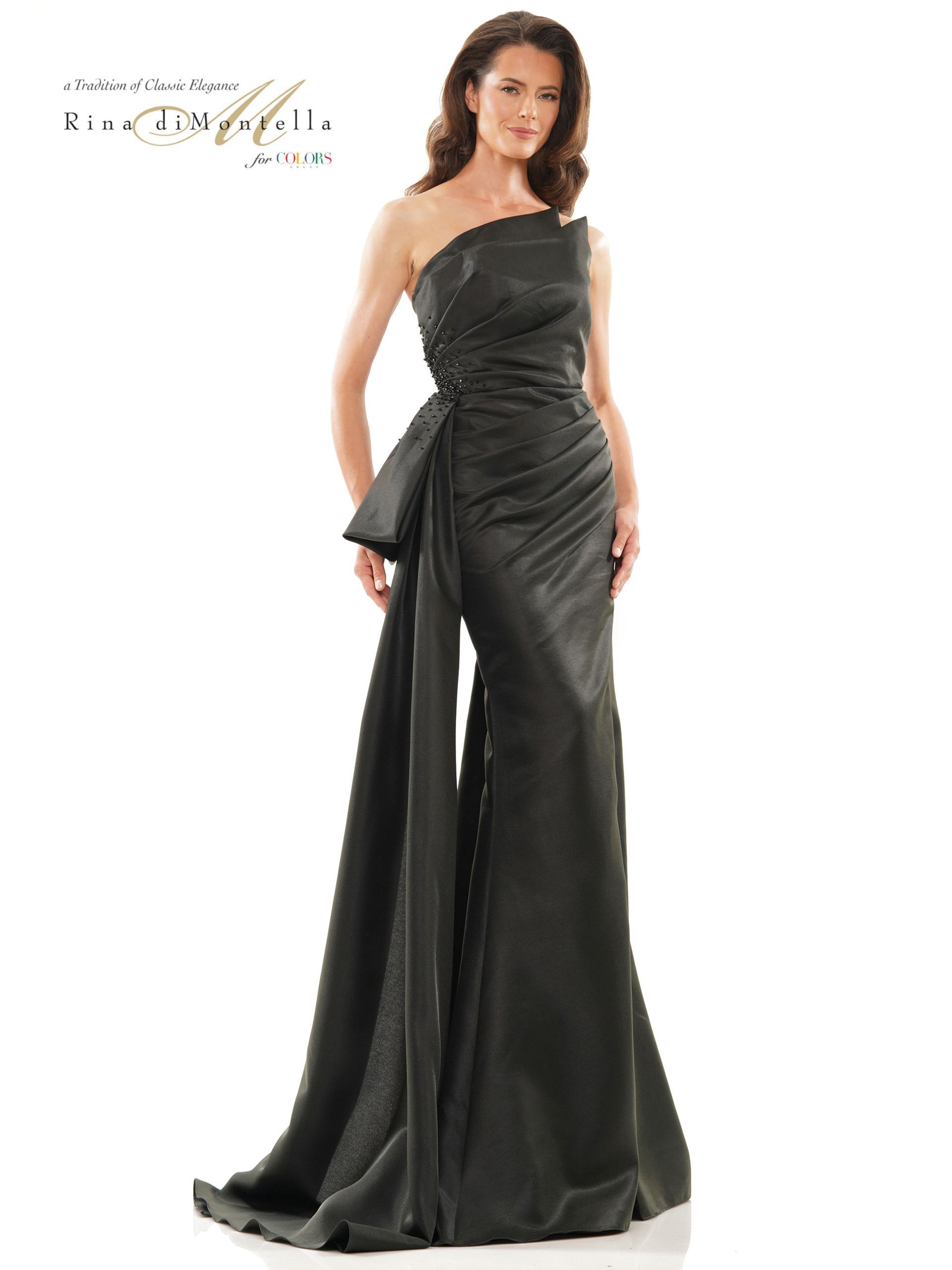 A woman is wearing a black one shoulder dress