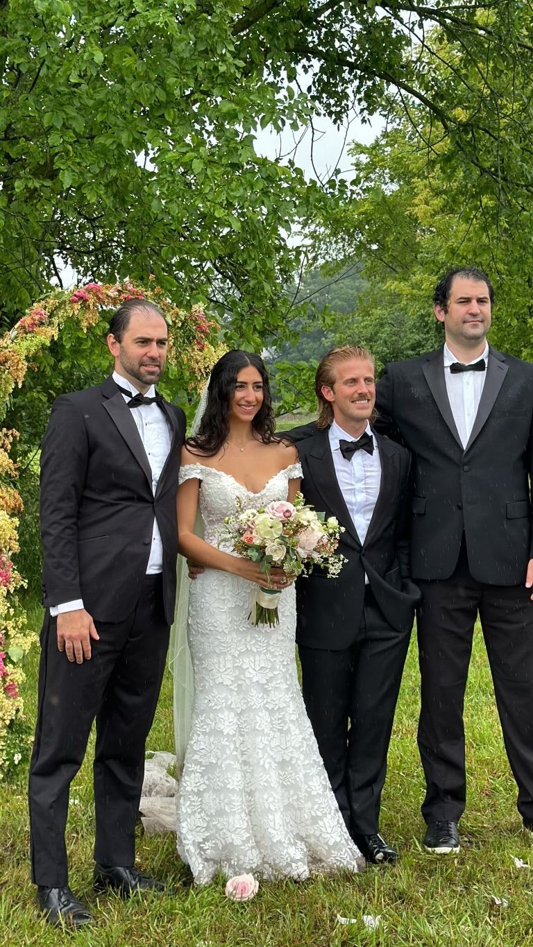 Amanda and Dylan Matthews by Fifi’s Bridal A Rainy Wedding Day 2024