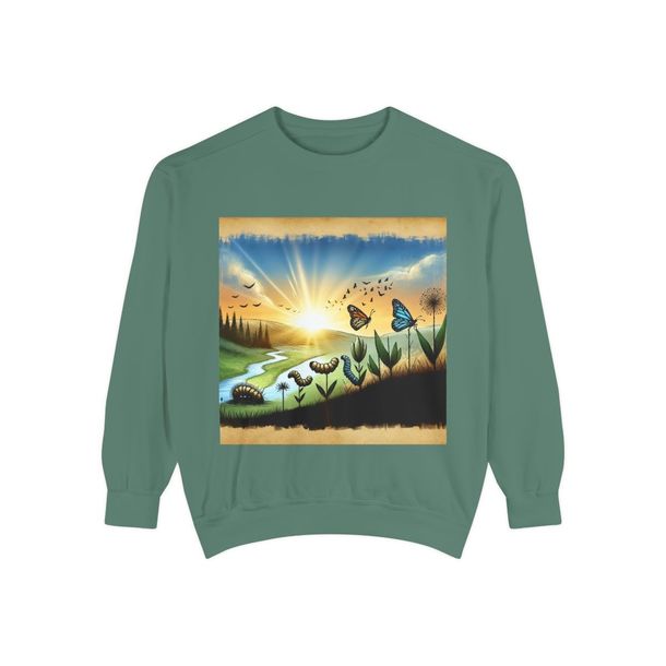 A green sweatshirt with a picture of butterflies and flowers on it