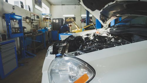 A Car in Repair Shop with Hood Open — Dunn's Auto Repair in Bundaberg East, QLD