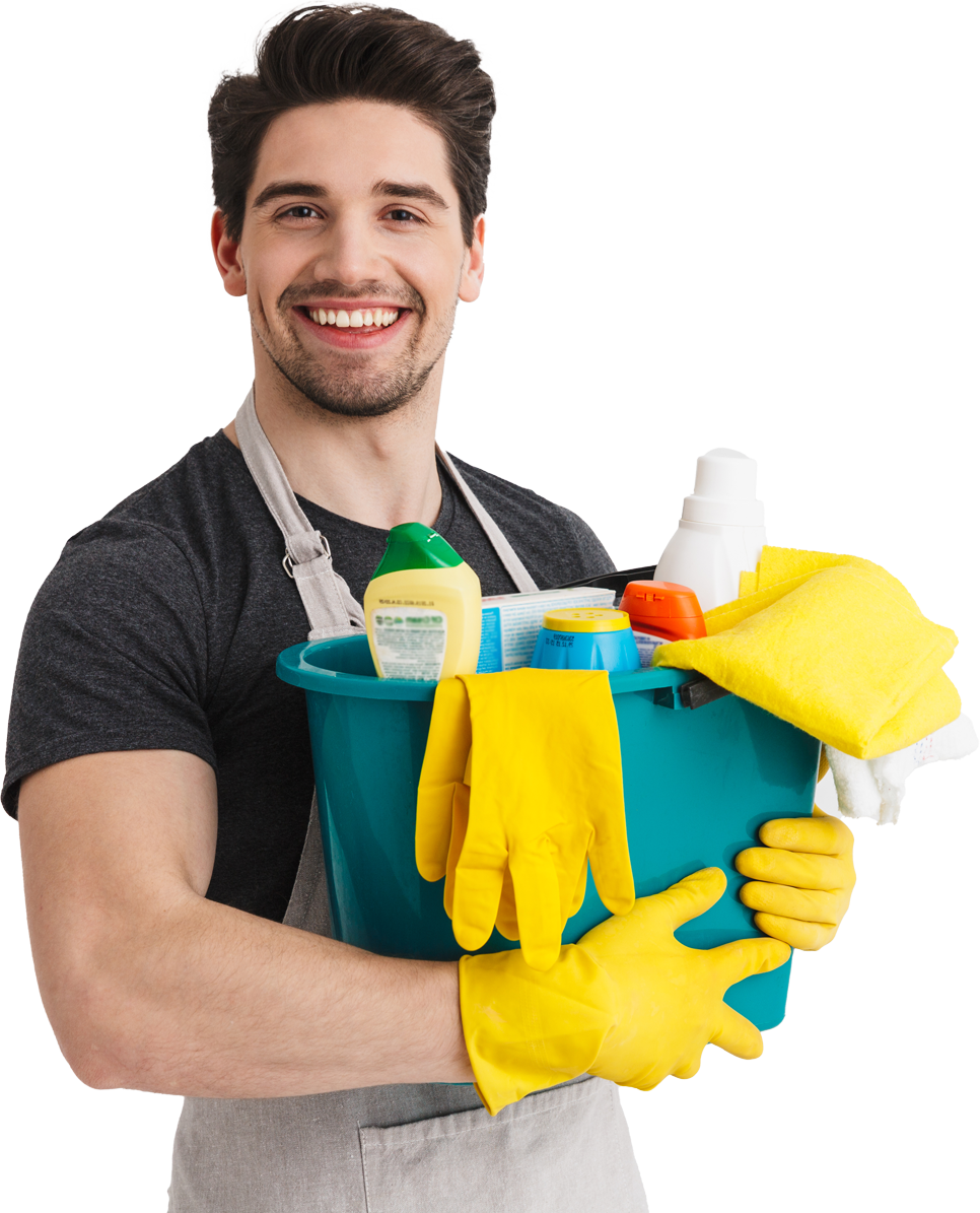 Man holding cleaning supplies in a turquoise bucket, smiling, wearing an apron, yellow gloves.