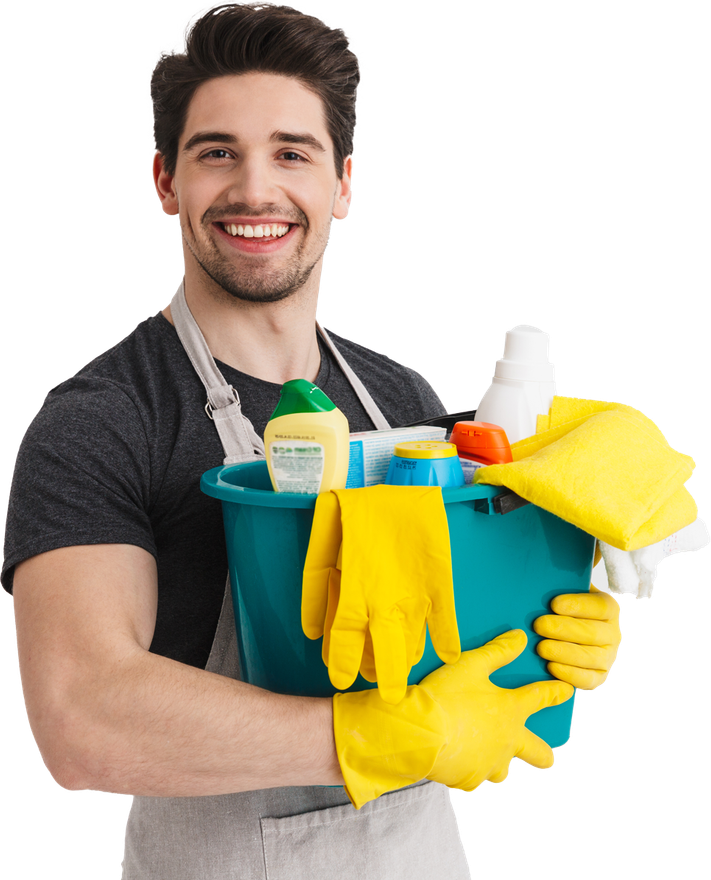 Man holding cleaning supplies in a turquoise bucket, smiling, wearing an apron, yellow gloves.