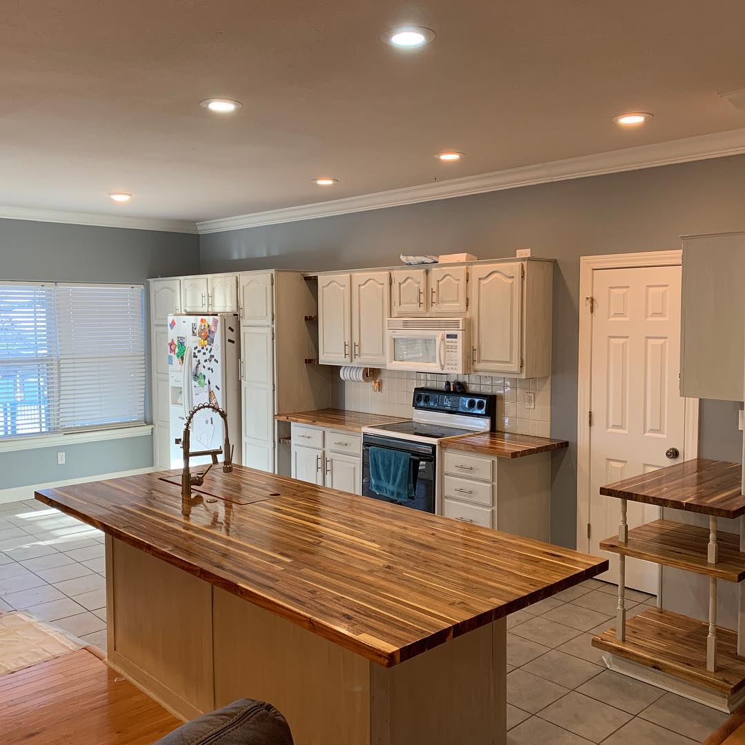 renovated kitchen by a modern touch