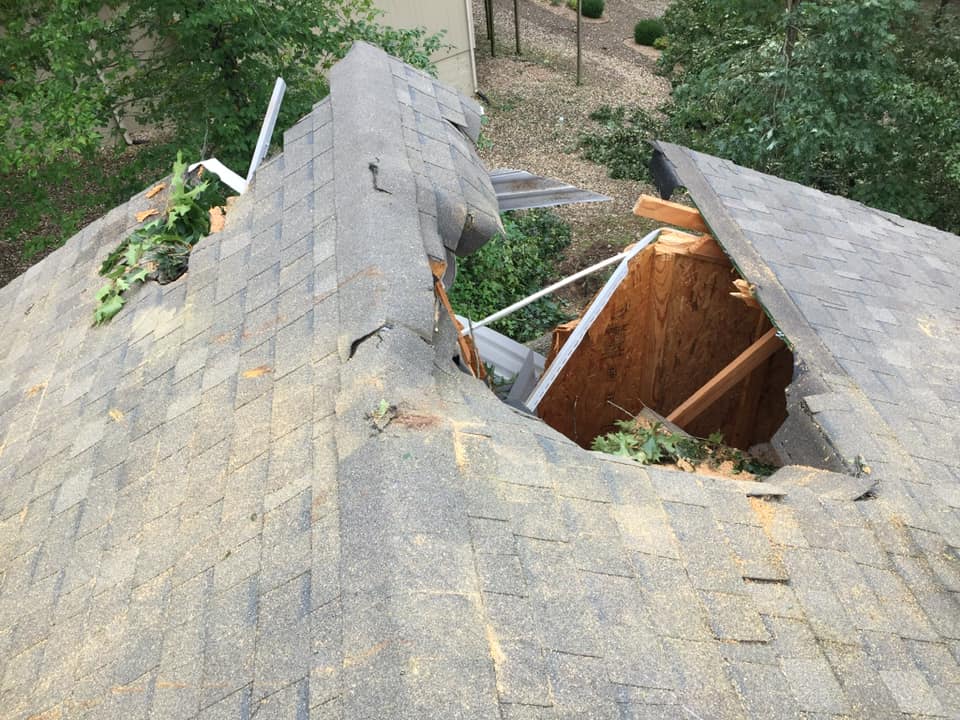A roof damaged by a storm