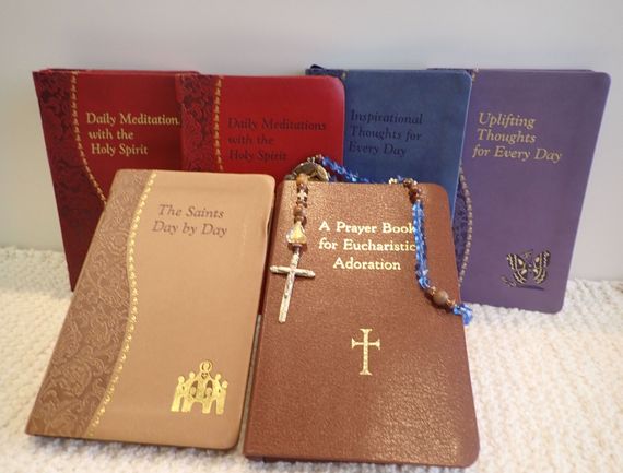 A prayer book with a cross on it