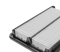 A close up of a air filter on a white background. | Kirk's Radiator & Auto A/C Inc.