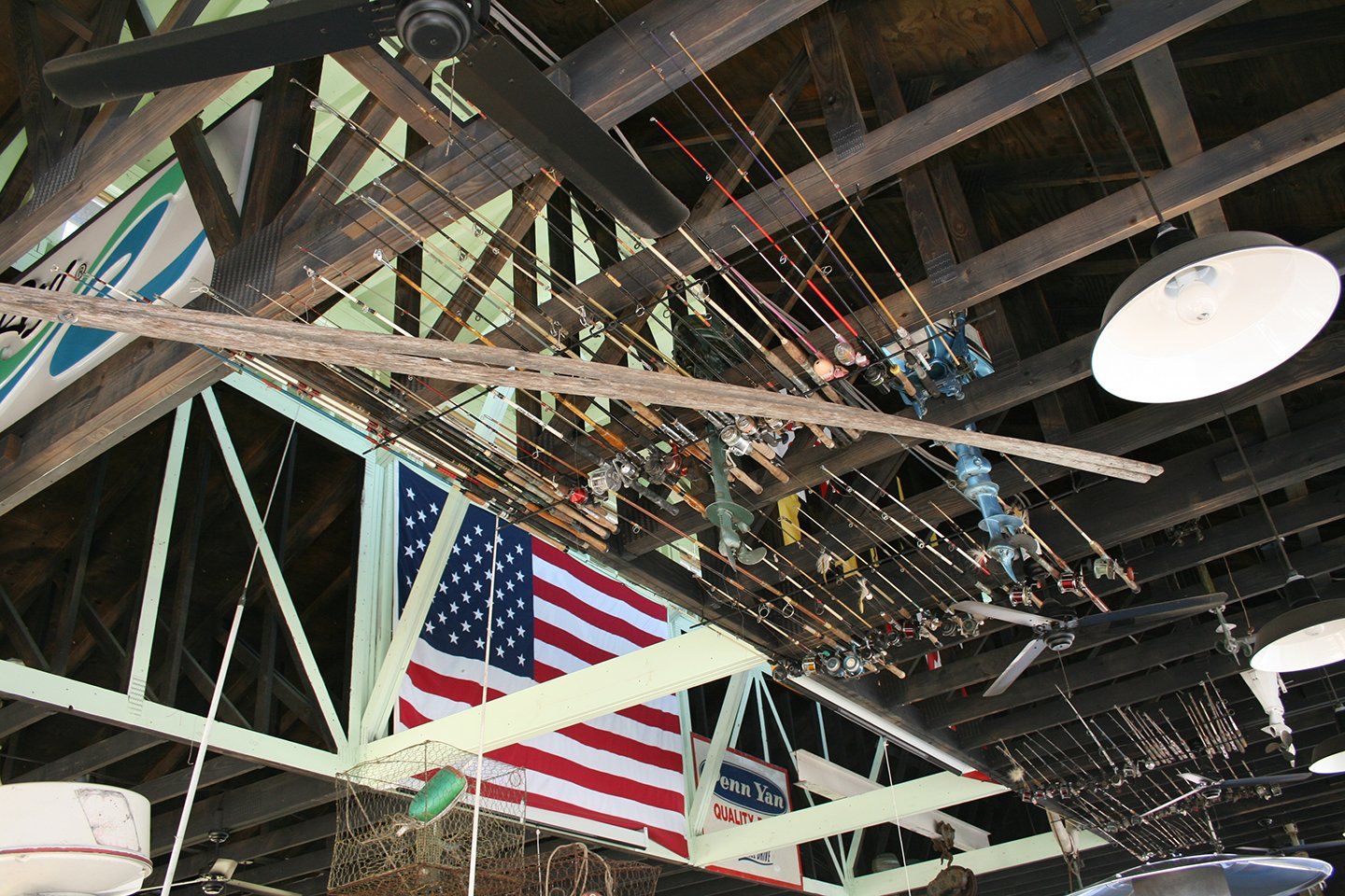 rods hanging from ceiling-Boat House