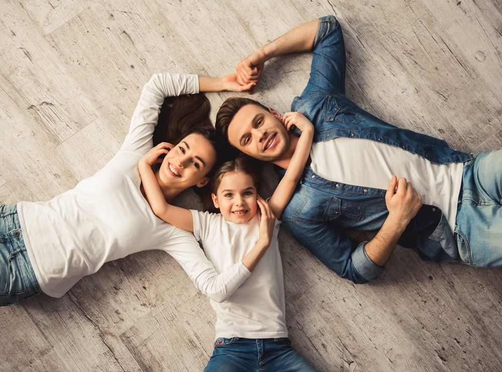 Happy Family on the Floor — Health Insurance in Australia