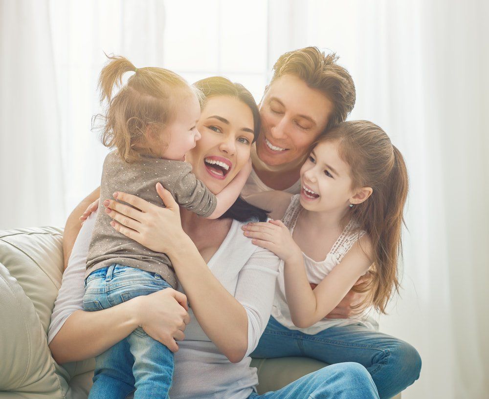 Family Hugging Each Other — Health Insurance in Australia