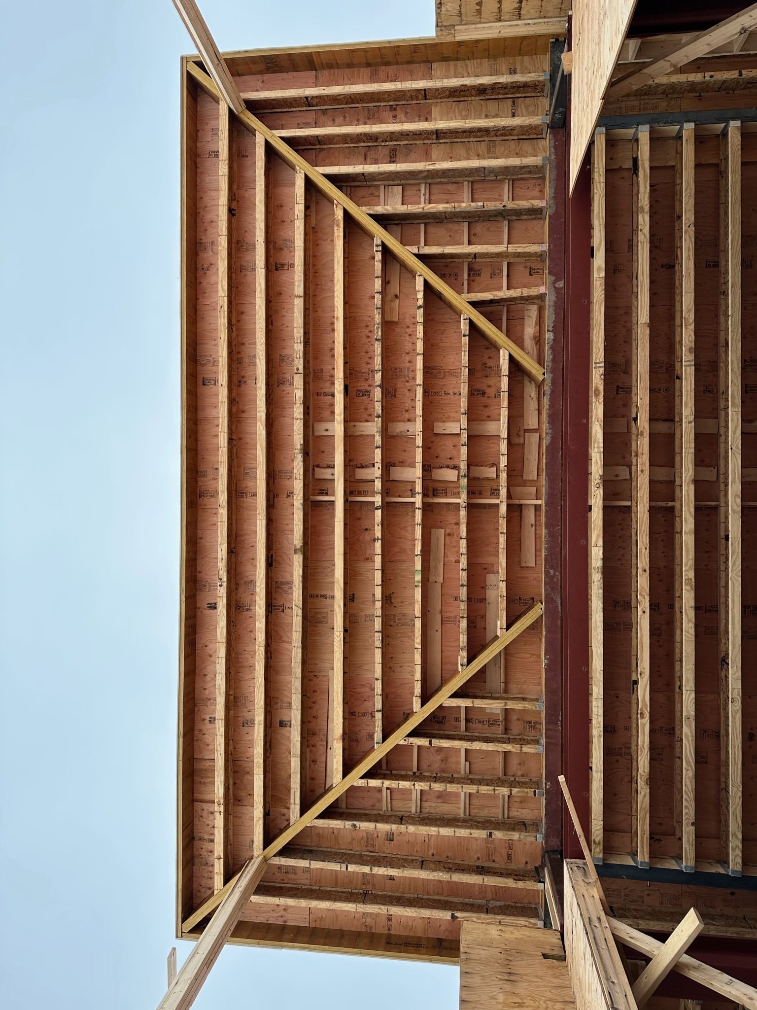 Looking up at the ceiling of a building under construction