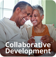 Smiling, embracing couple; collaborative development concept. Indoors.