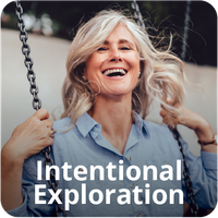 Woman with gray hair laughing on a swing; the words