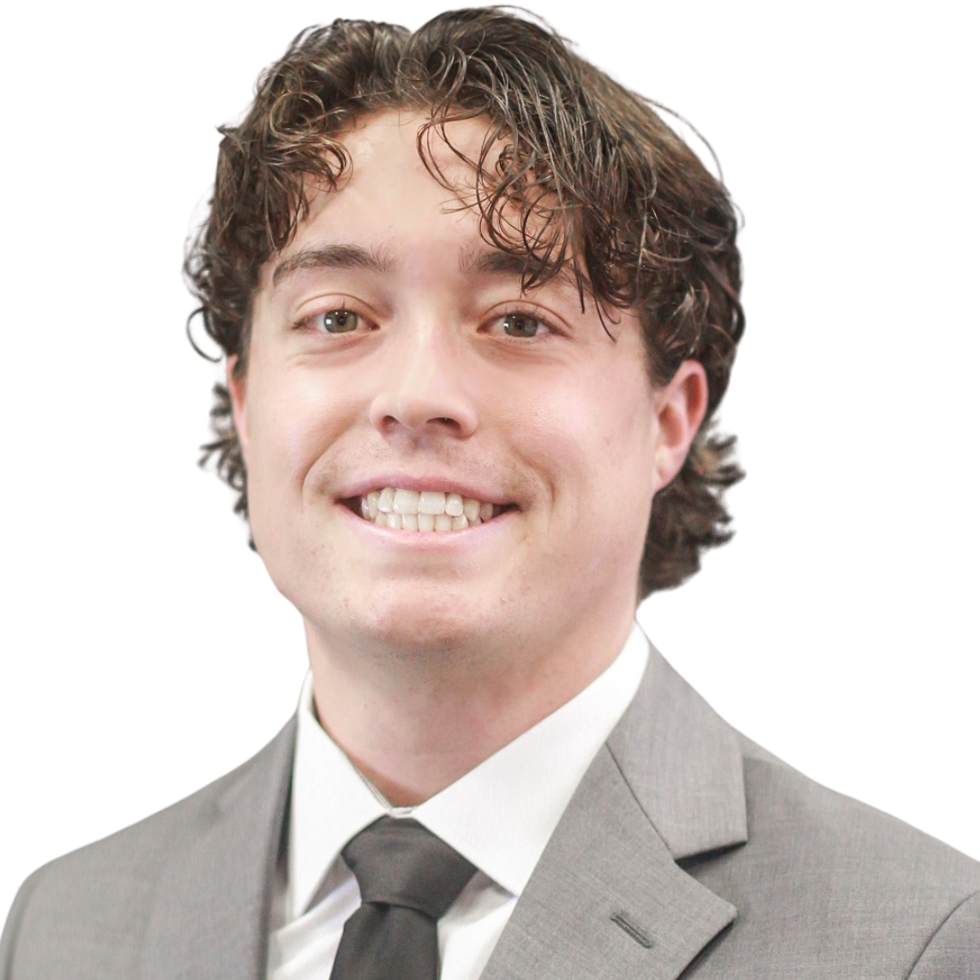 Woman with long blonde hair, smiling, looking at the camera.