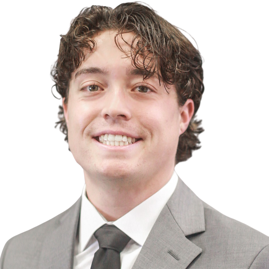 Man with brown hair smiling.