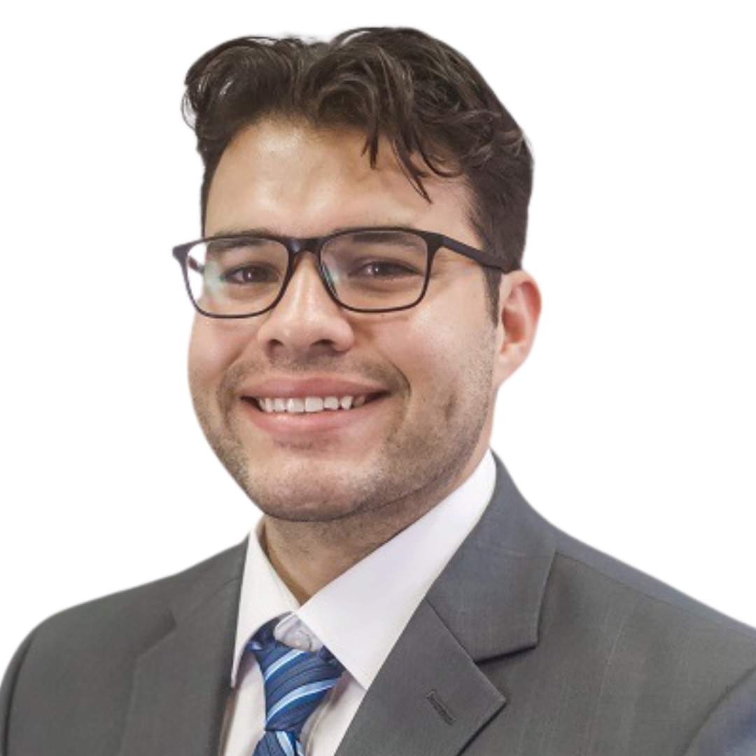 Man with black hair and black glasses smiling.