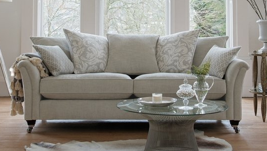 a stunning grey coloured, floral designed sofa