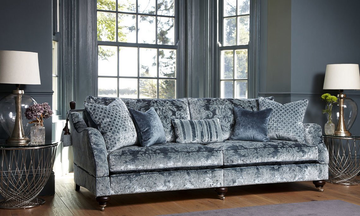 a stunning grey coloured, floral designed sofa