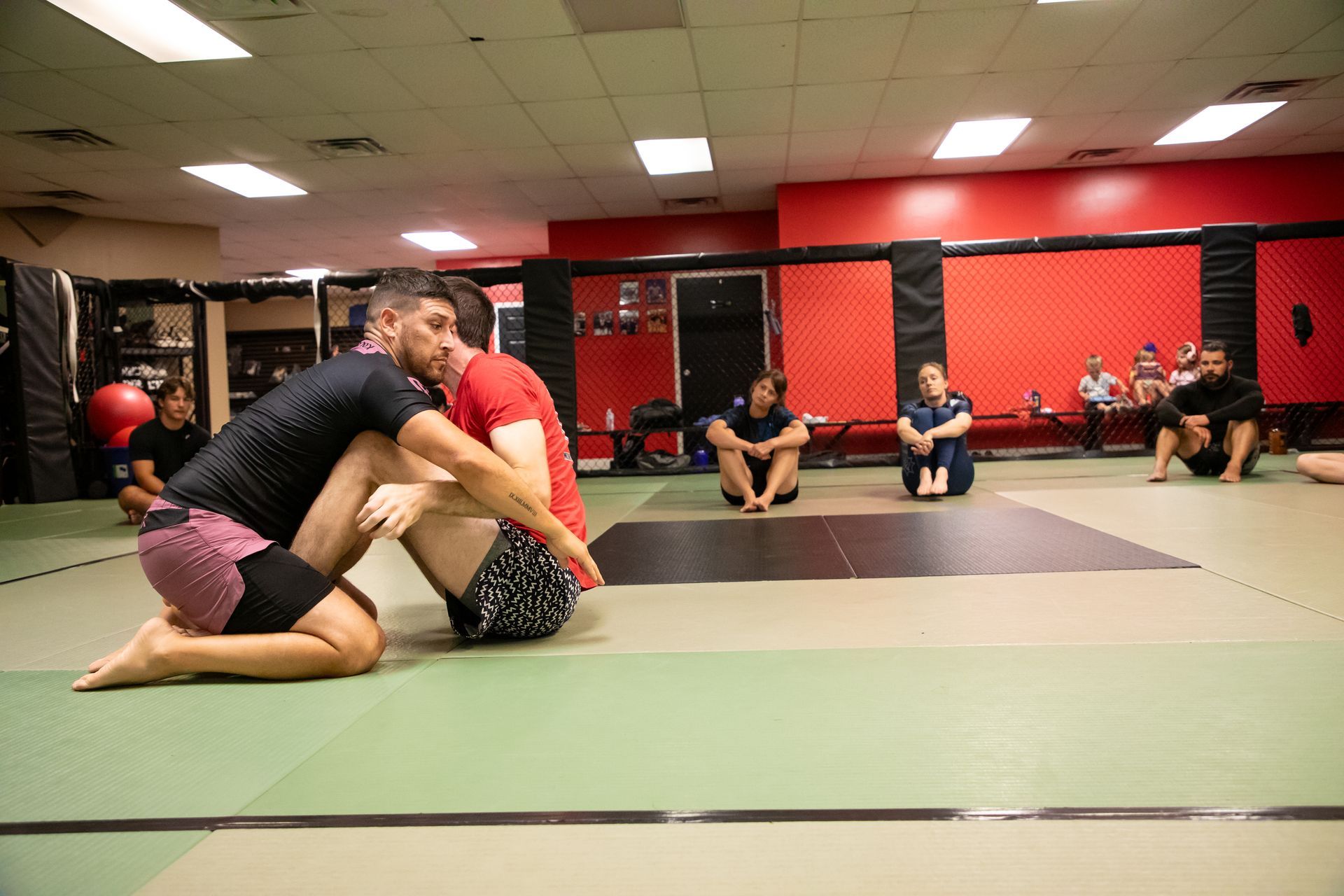 Adult Jiu-Jitsu partners drilling a controlled guard pass at Mason Dixon Jiu-Jitsu.