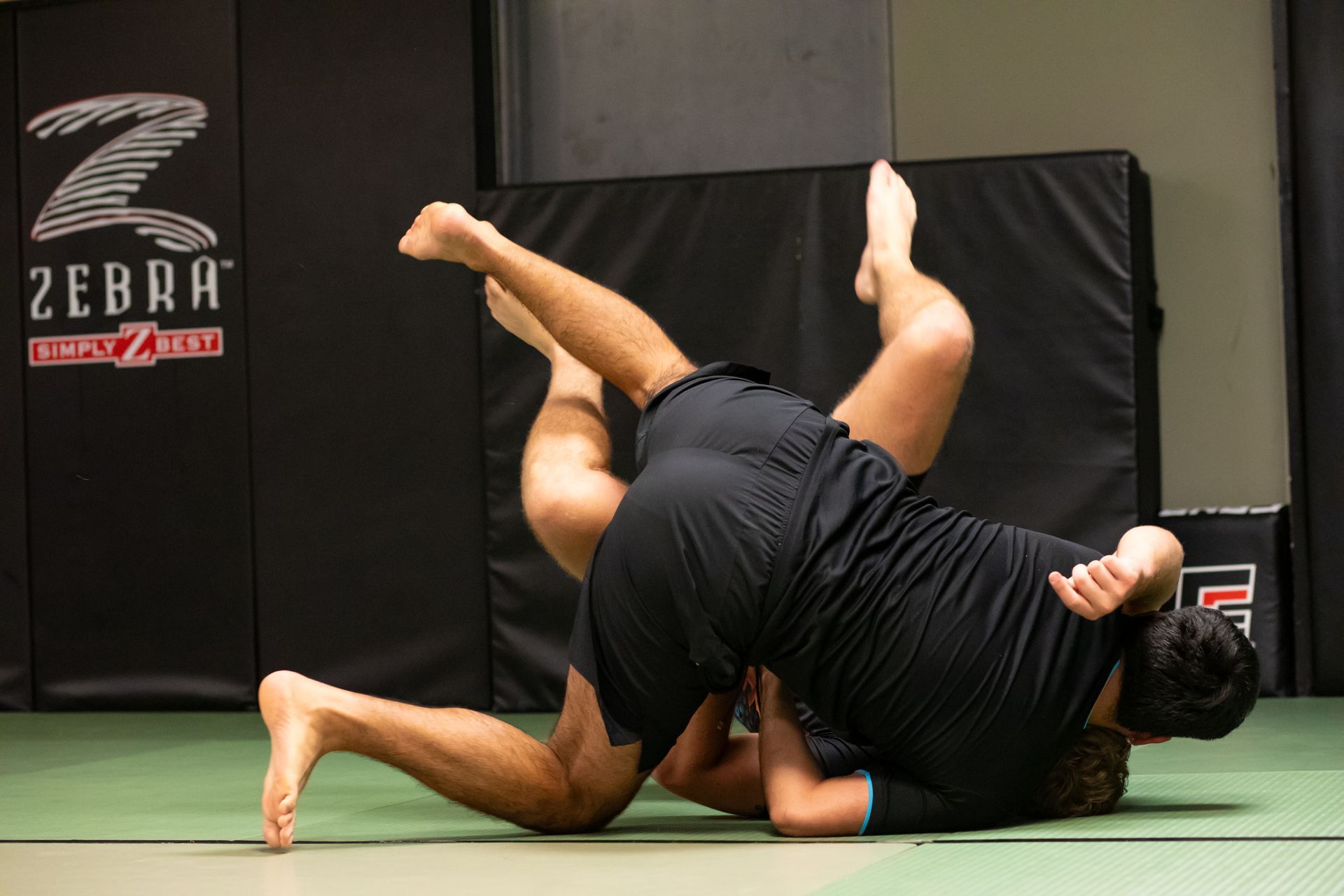 Adults drilling Brazilian Jiu-Jitsu techniques at Mason Dixon Jiu-Jitsu in East Chambersburg, PA.