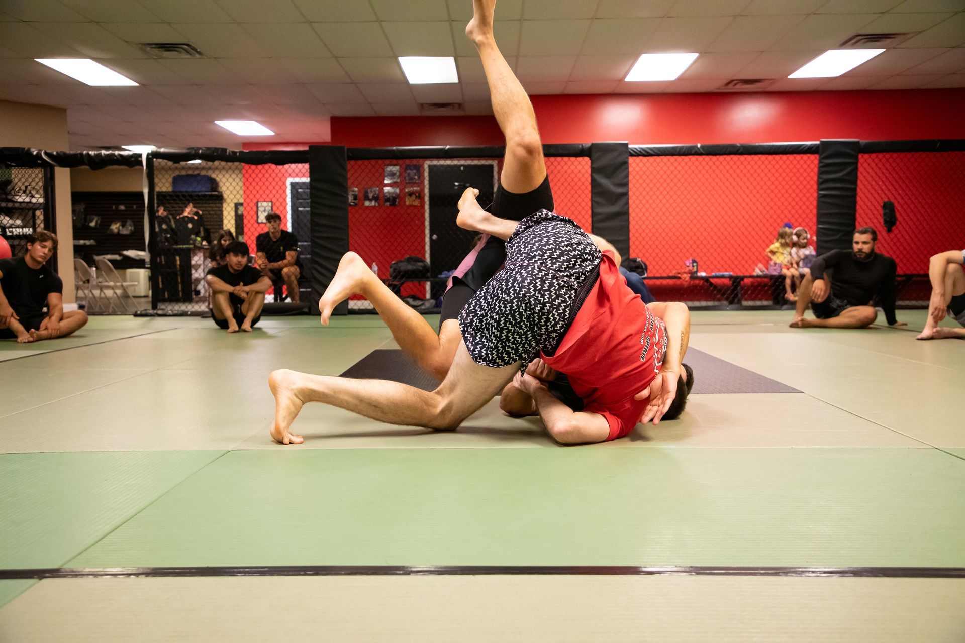 Adult students drilling Jiu-Jitsu technique at Mason Dixon Jiu-Jitsu in East Chambersburg, PA for energy and focus.
