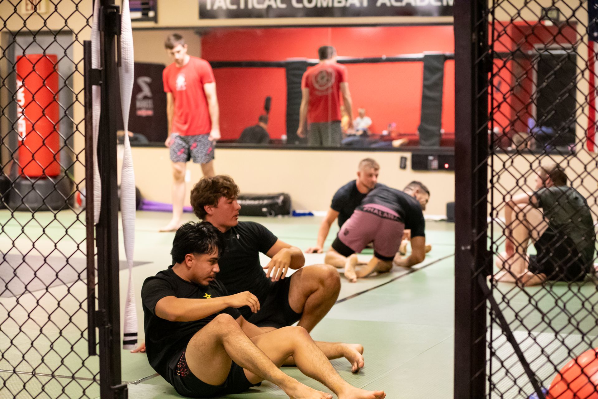 Adults practicing grappling drills at Mason Dixon Jiu-Jitsu in East Chambersburg, PA for fast fitness and focus.