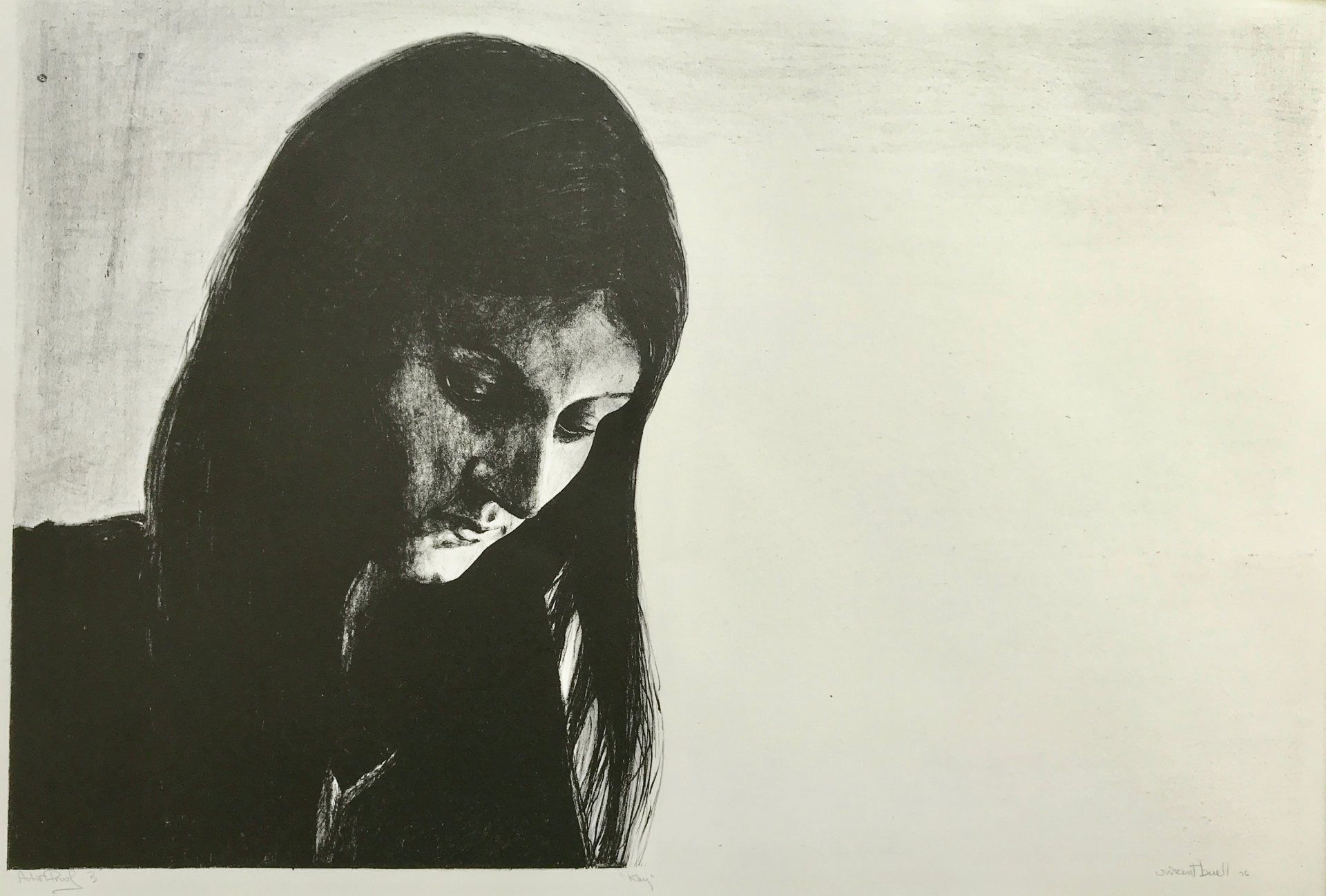 A black and white photo of a woman with long hair