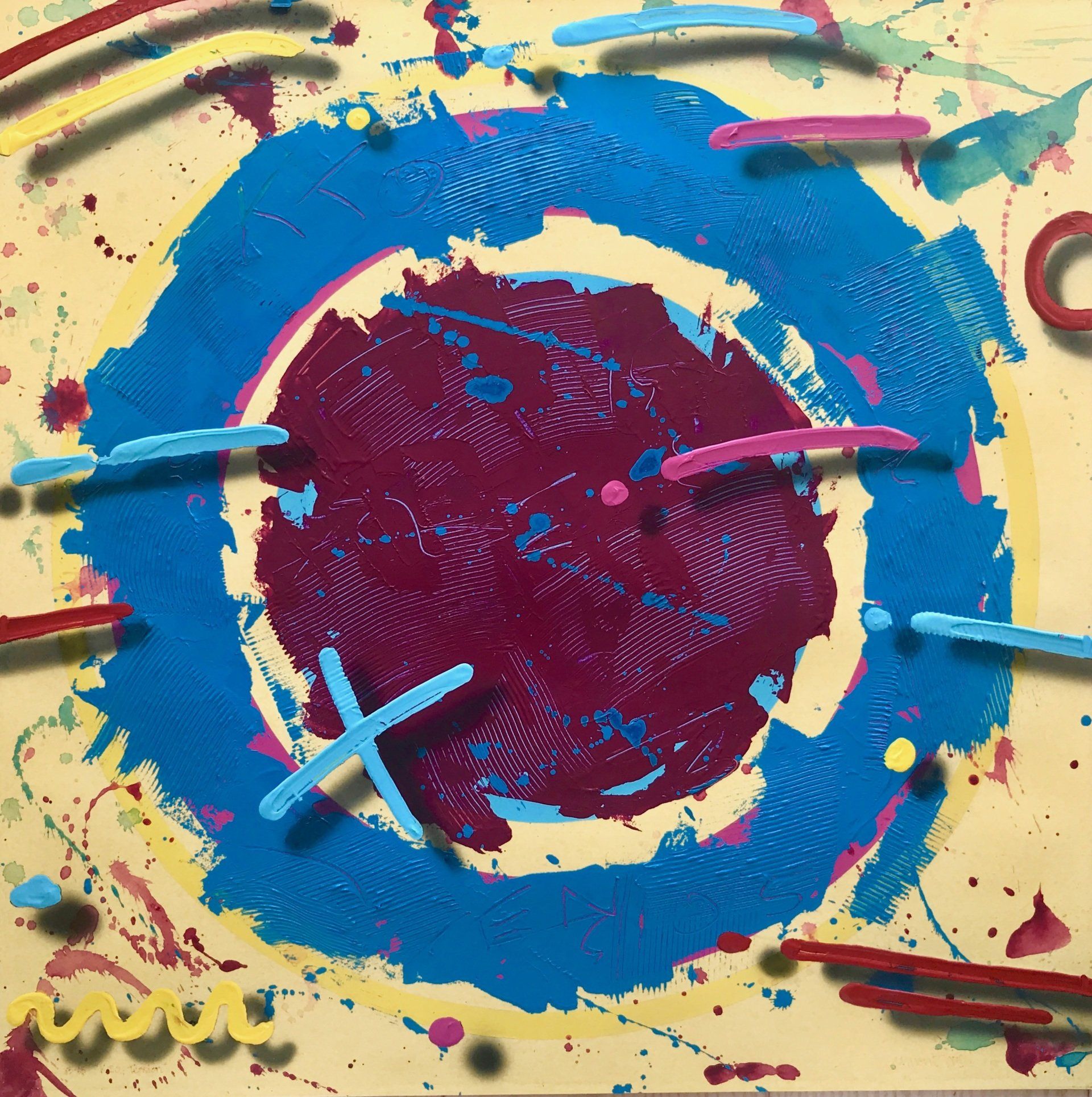 A colorful painting with a blue circle in the middle