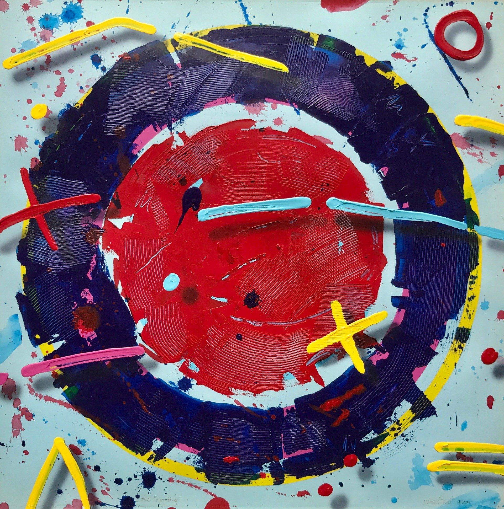 A colorful painting with a red circle in the middle
