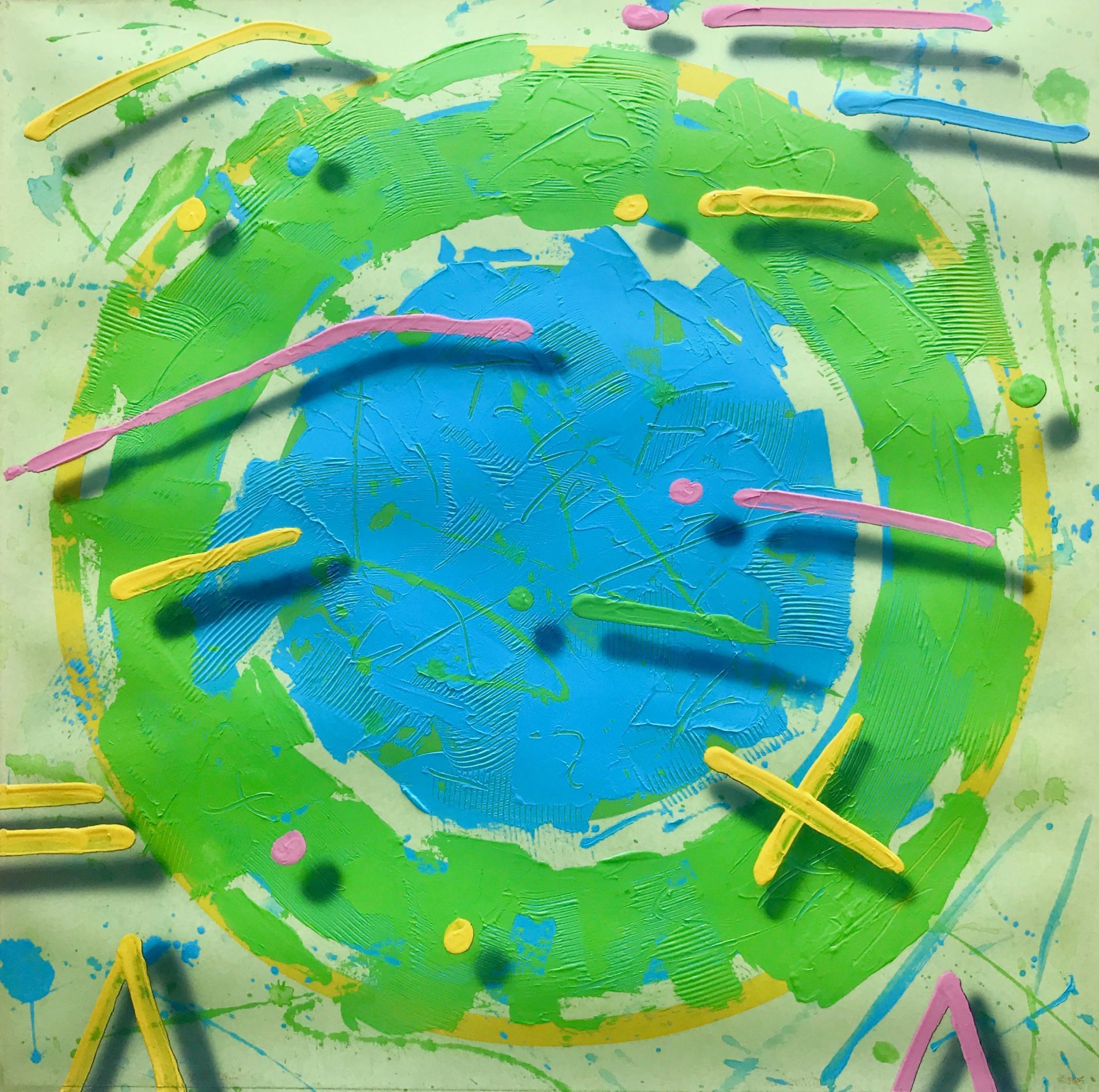 A painting of a green circle with a blue center