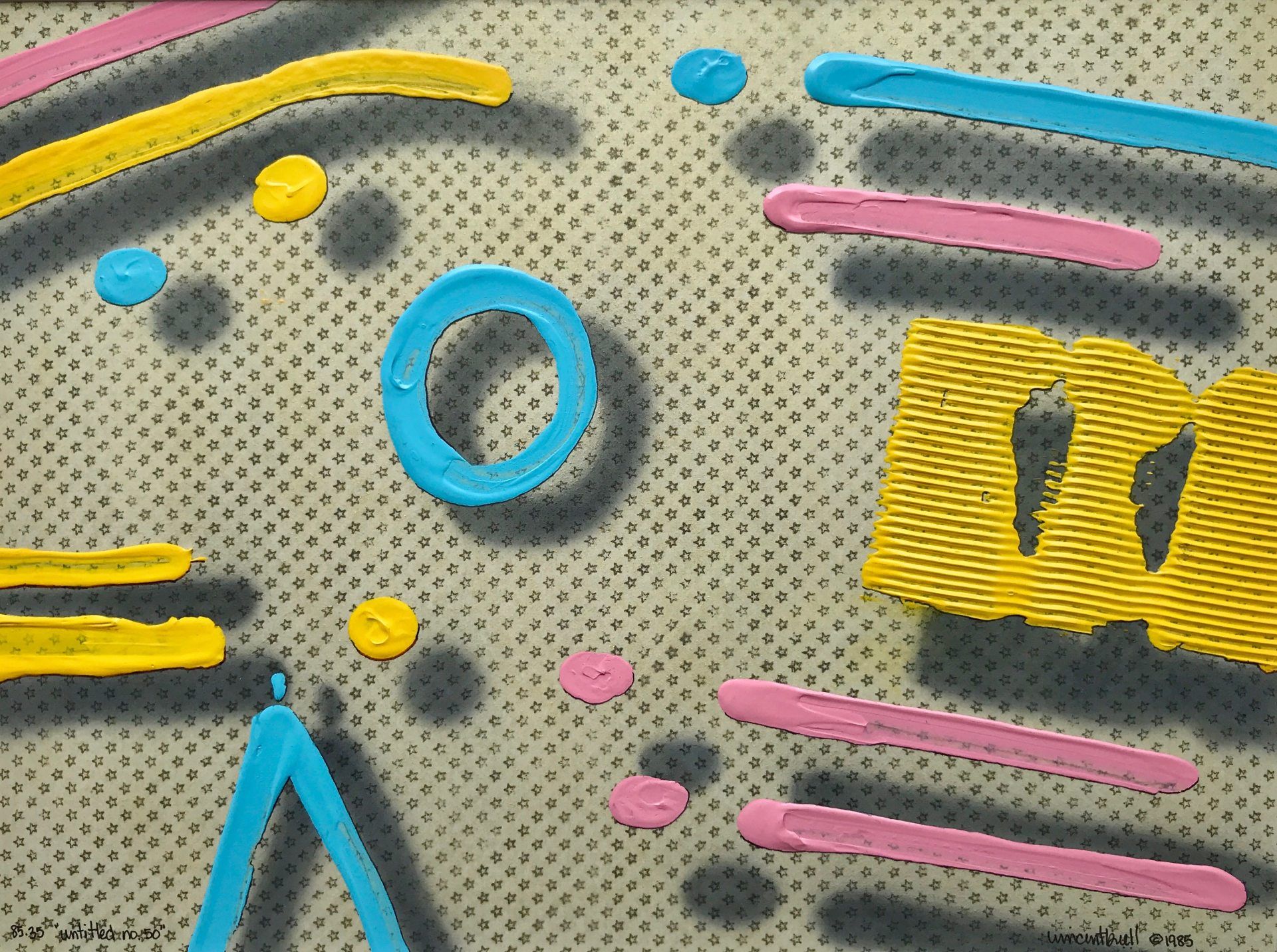 A close up of a colorful painting on a polka dot background.