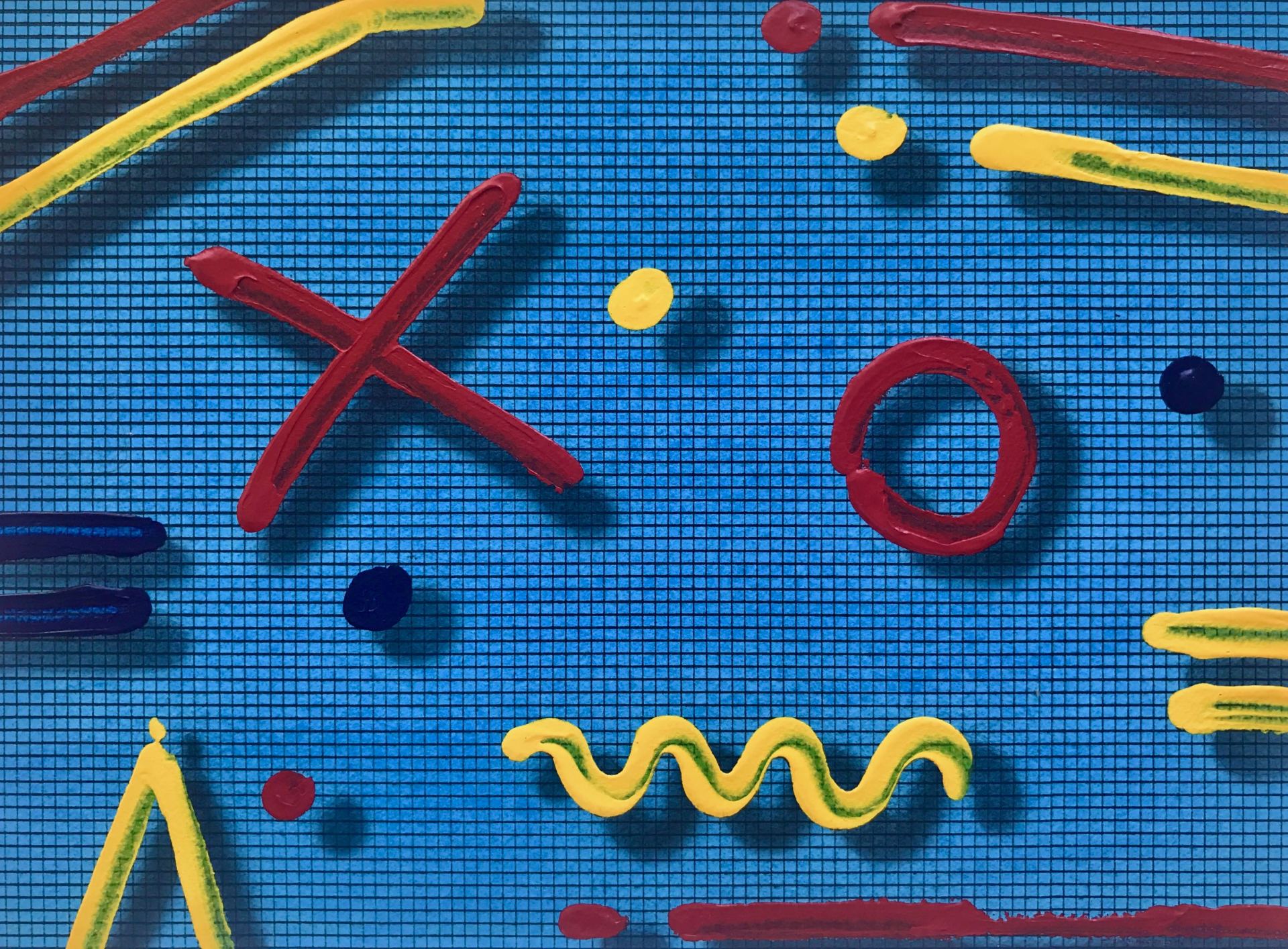 A blue background with a bunch of colorful objects on it