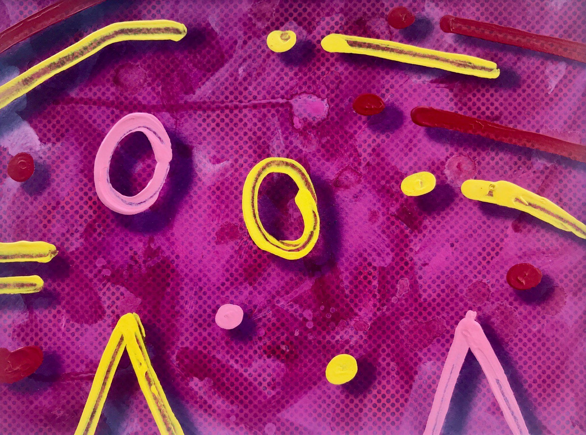 A purple background with circles and triangles on it