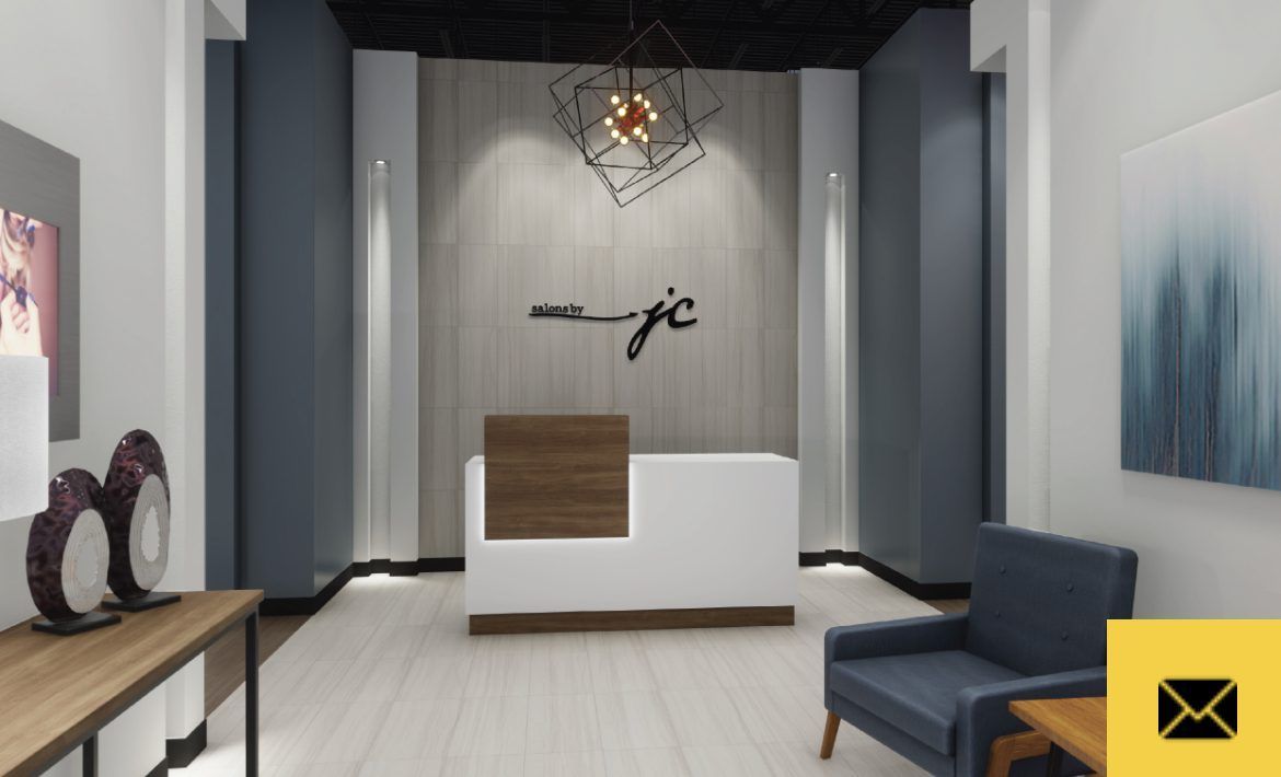 Modern office reception area with white desk, blue accent walls, and wood-tone accents.