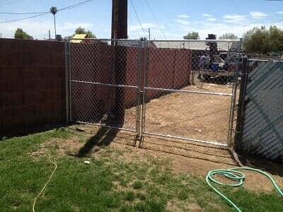 chain link fence in backyard - chain link fence contractor