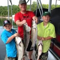 family fishing striped bass