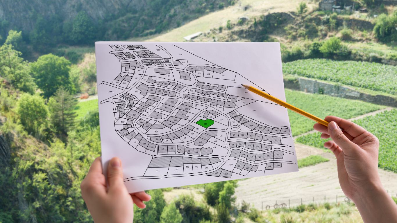 A person is holding a map with a pencil in their hand.
