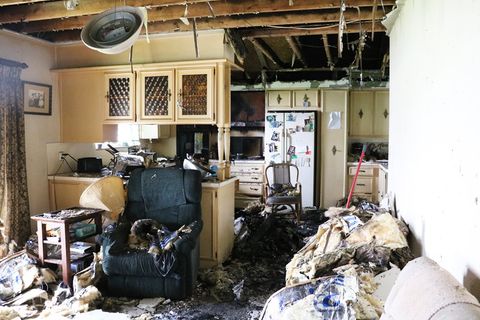 photograph of a room in a house that has been damaged by fire and smoke