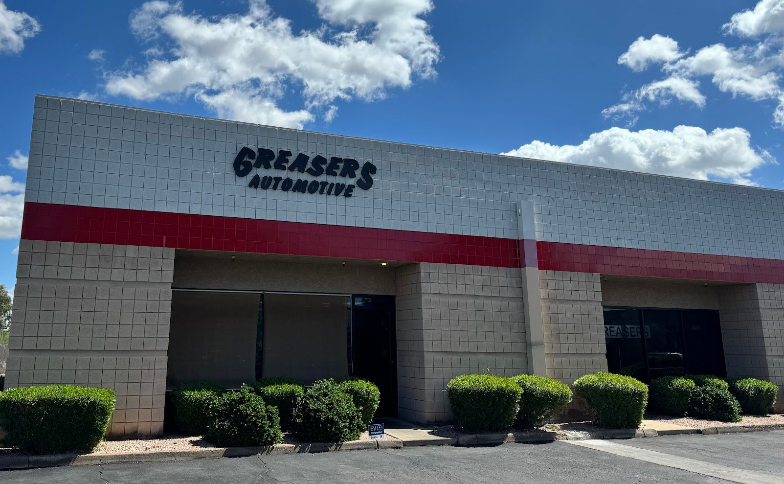Greaser's Automotive Building with a Red Stripe | Greasers Automotive