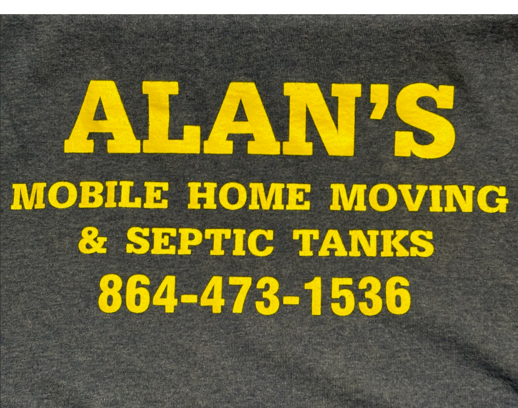 A sign for alan 's mobile home moving and septic tanks A sign for alan 's mobile home moving and septic tanks