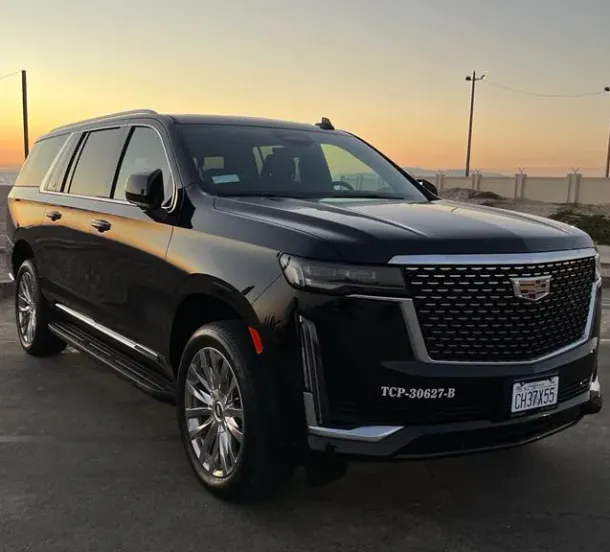 LAX VIP luxury suv at sunset