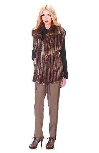 Woman Wearing Brown Fur Jacket with Vertical Linings — Bayonne, NJ — Famous Furs Ltd.