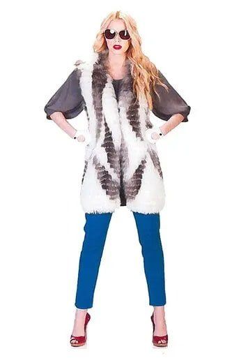 Woman Wearing White Fur Jacket — Bayonne, NJ — Famous Furs Ltd.