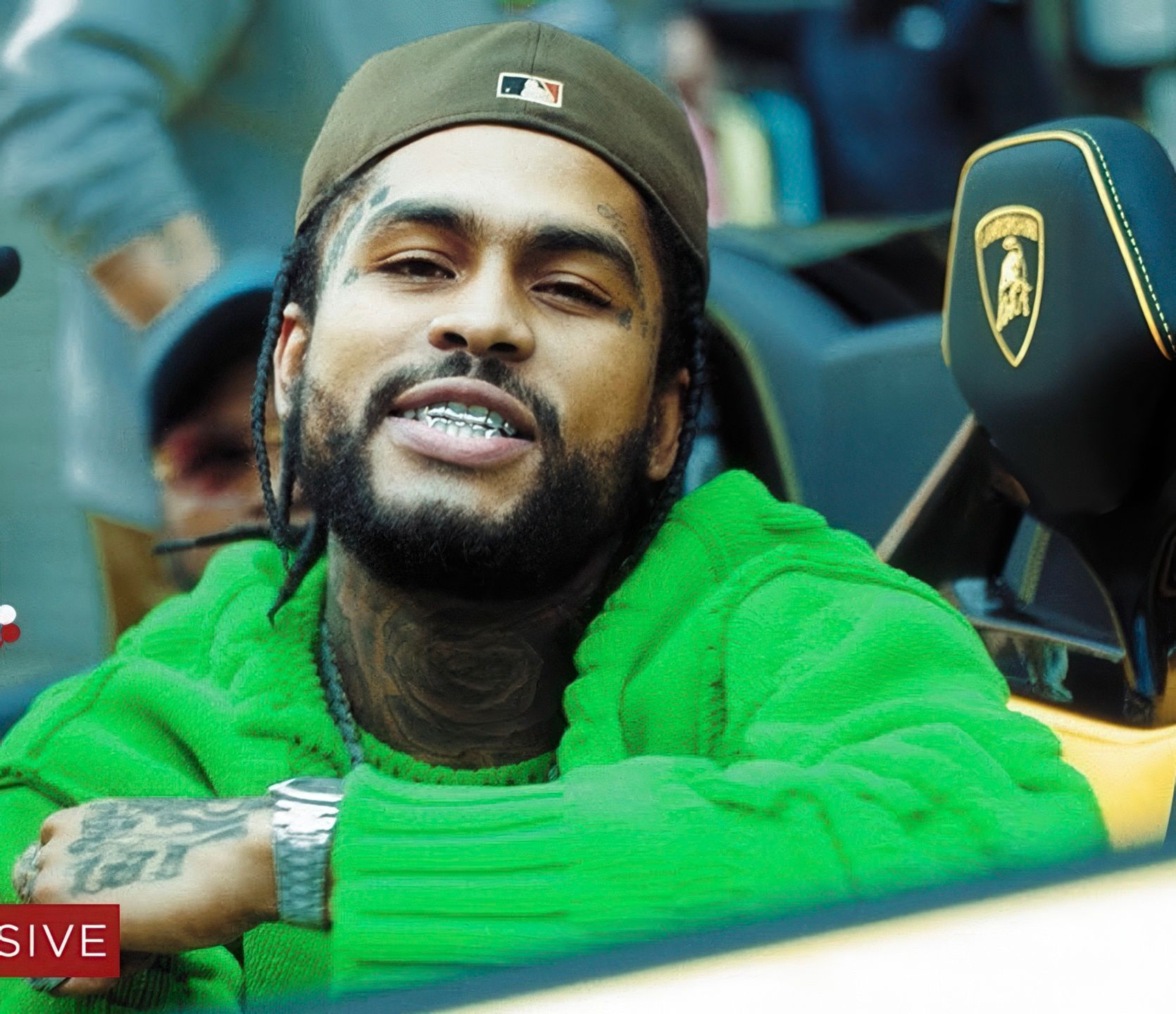 Dave East wearing Gumbo Grillz