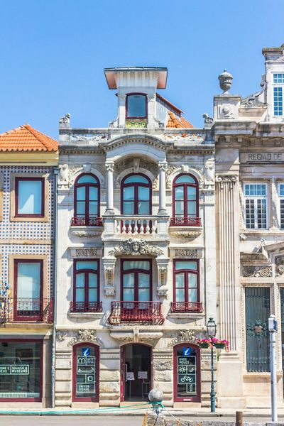 A large building with a lot of windows and balconies