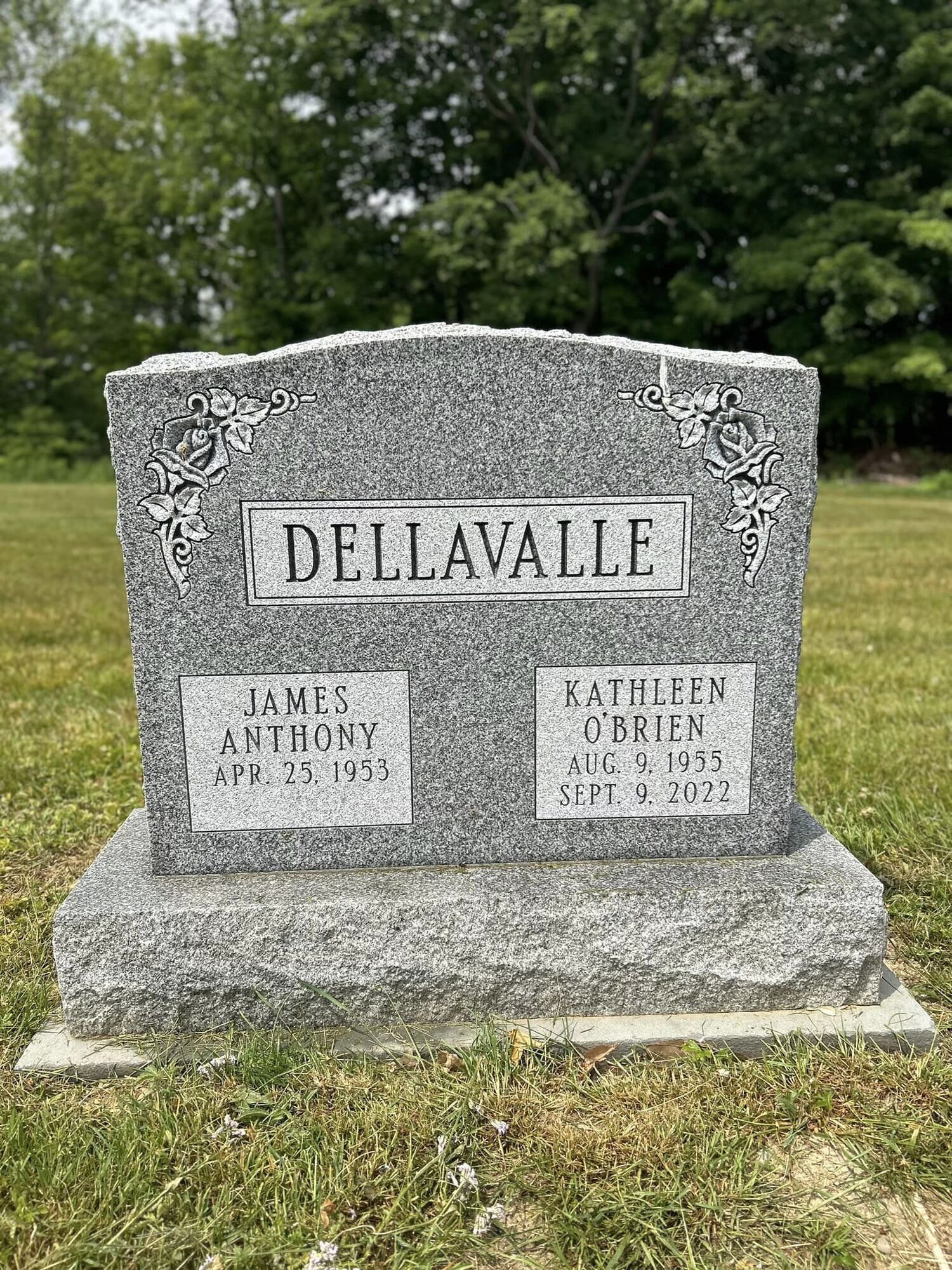 Grave of the Dellavalle family. Stone has names James Anthony and Esther O'Brien with dates.