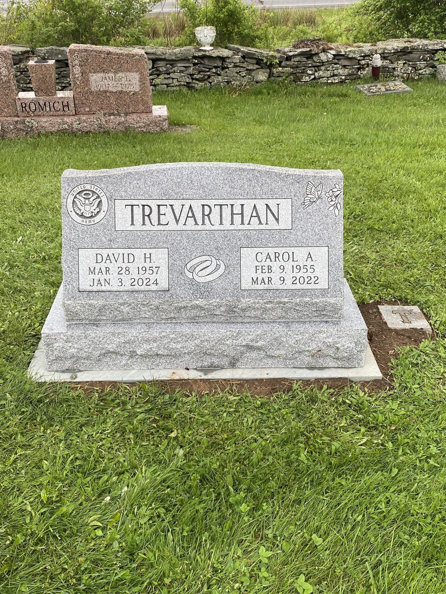 Headstone for the Trevarthan family in a cemetery; includes names, dates, and a symbol.