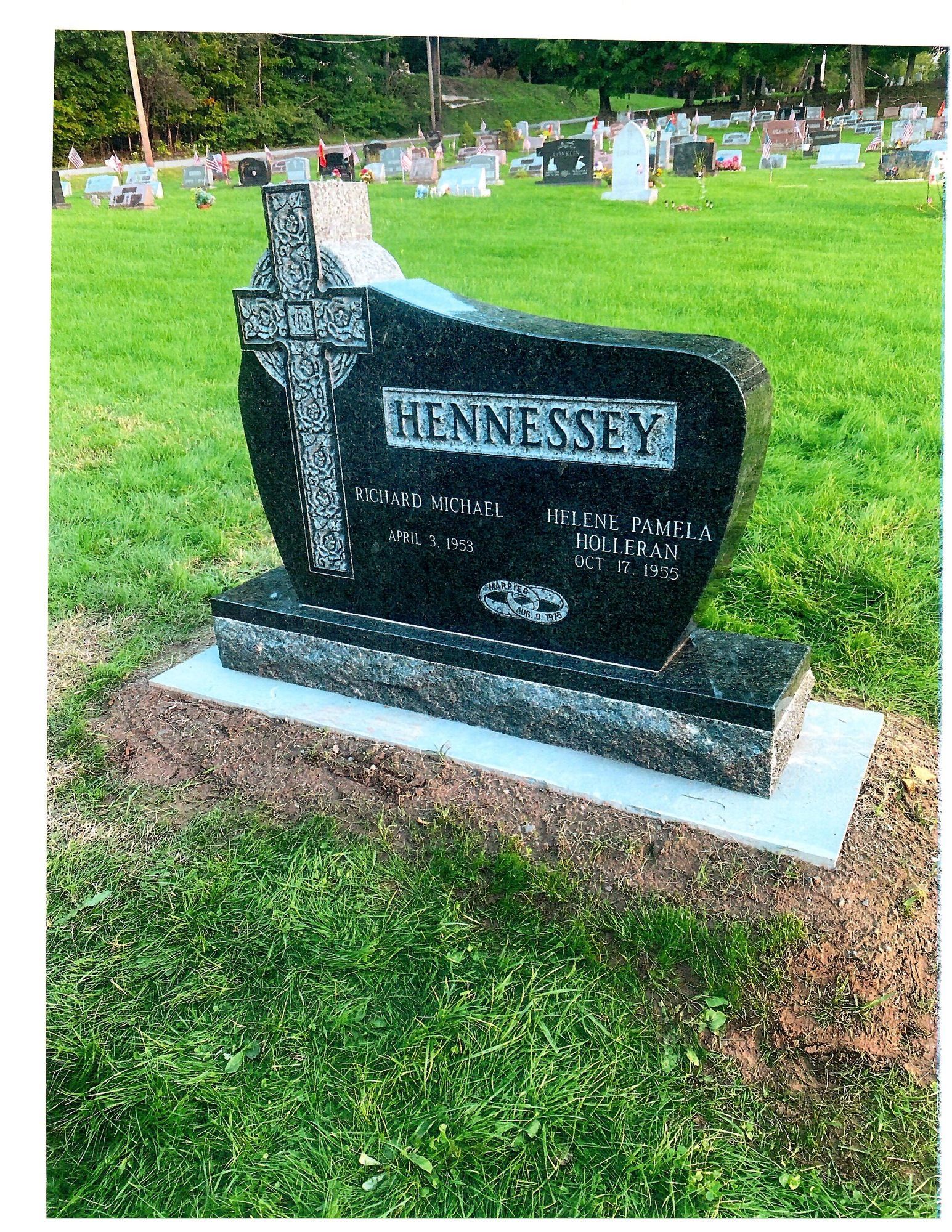 Black granite headstone with the name 